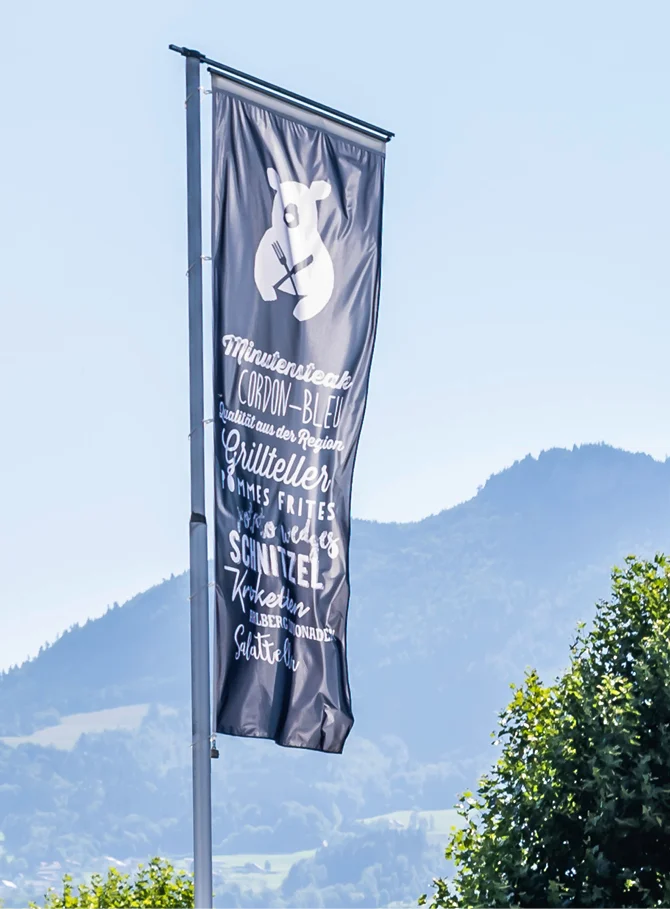 Zurgams Schnitzelbaer Flagge Logo